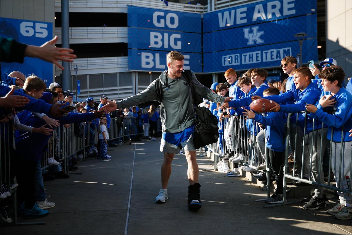 Kentucky football quarterback Will Levis participated in the Cat Walk while wearing a walking boot on his left foot before UK’s game against South Carolina.