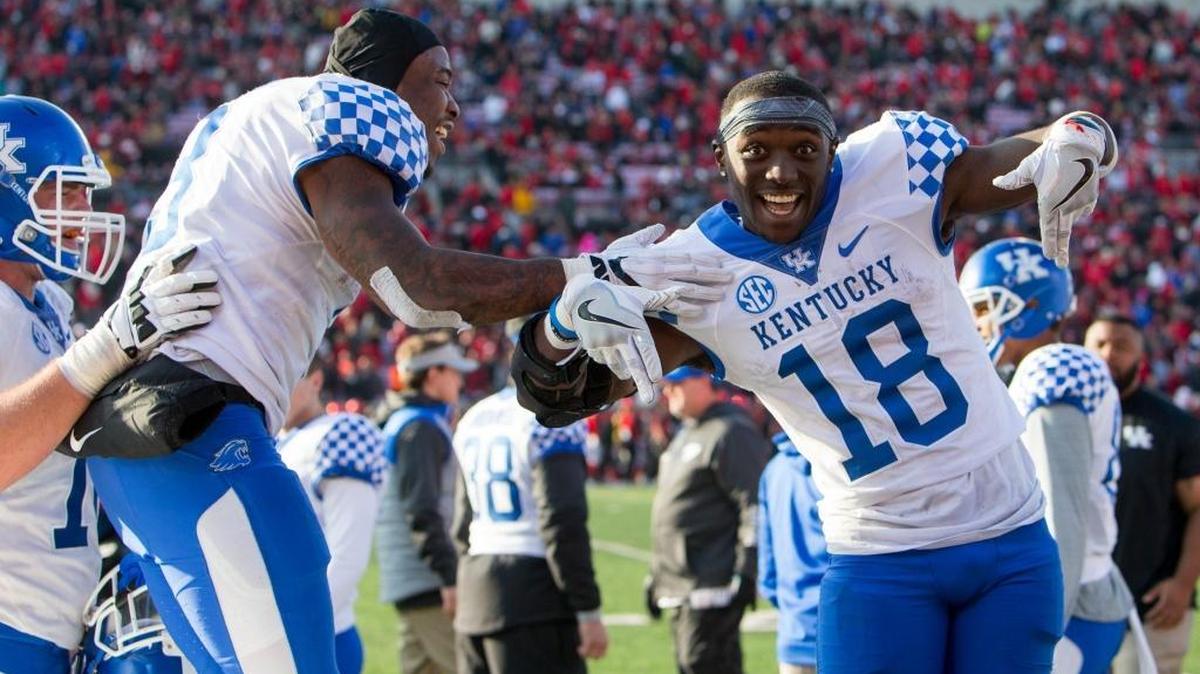 Kentucky running backs Jojo Kemp, left, and Boom Williams celebrated the Wildcats’ win at Louisville last month.