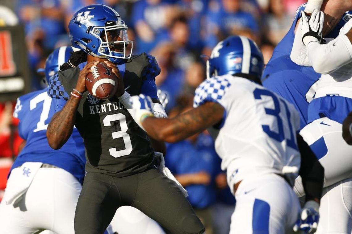 Kentucky quarterback Terry Wilson, No. 3, dropped back to pass the ball during the Blue-White Spring Game at Kroger Field.