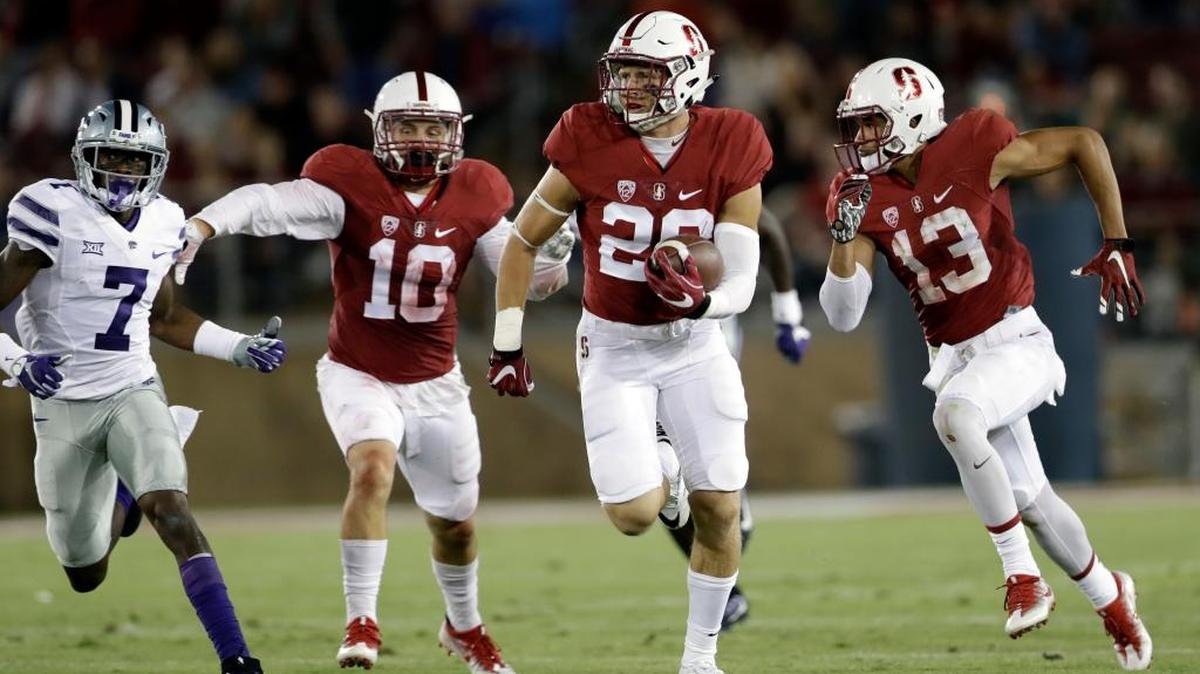 Stanford safety Dallas Lloyd runs with the ball after an interception against Kansas State during the second half of an NCAA college football game Friday, Sept. 2, 2016, in Stanford, Calif. Stanford won 26-13.