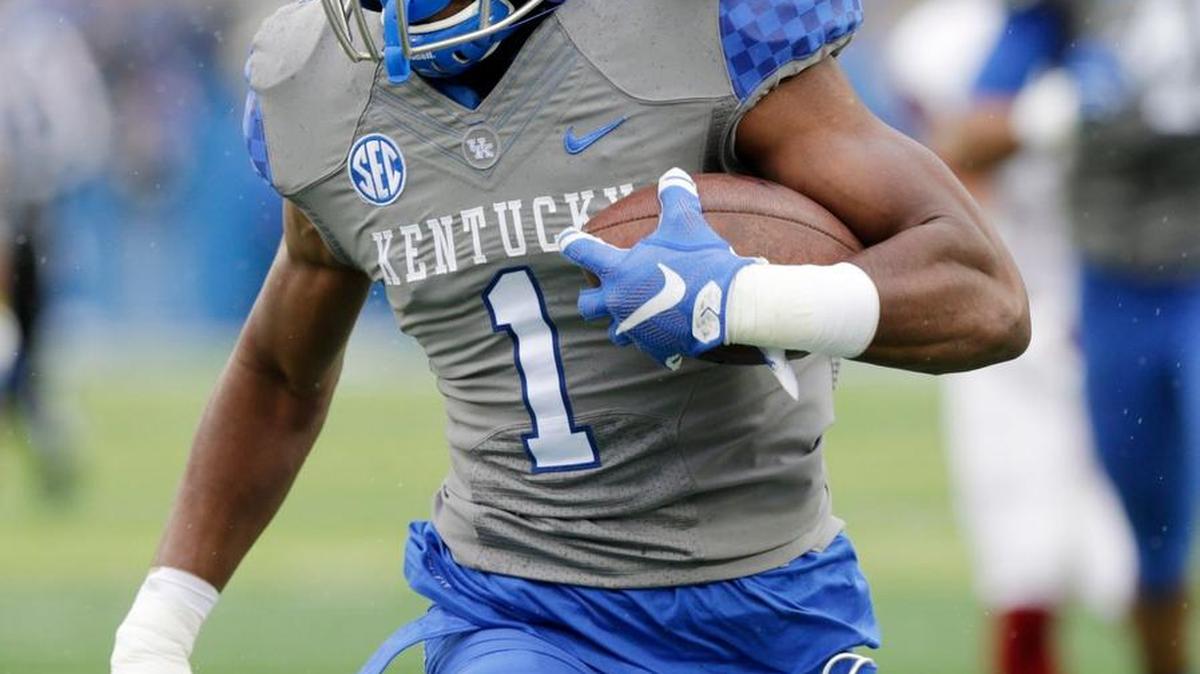 UK safety A.J. Stamps returned an interception against Louisville last season. Stamps has signed with Cleveland.
