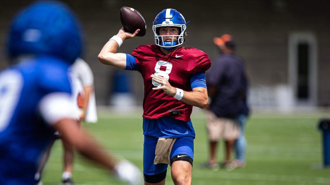 UK quarterback Cutter Boley throws a pass during an open practice during the team’s media day at the Joe Craft Football Training Facility on Friday.