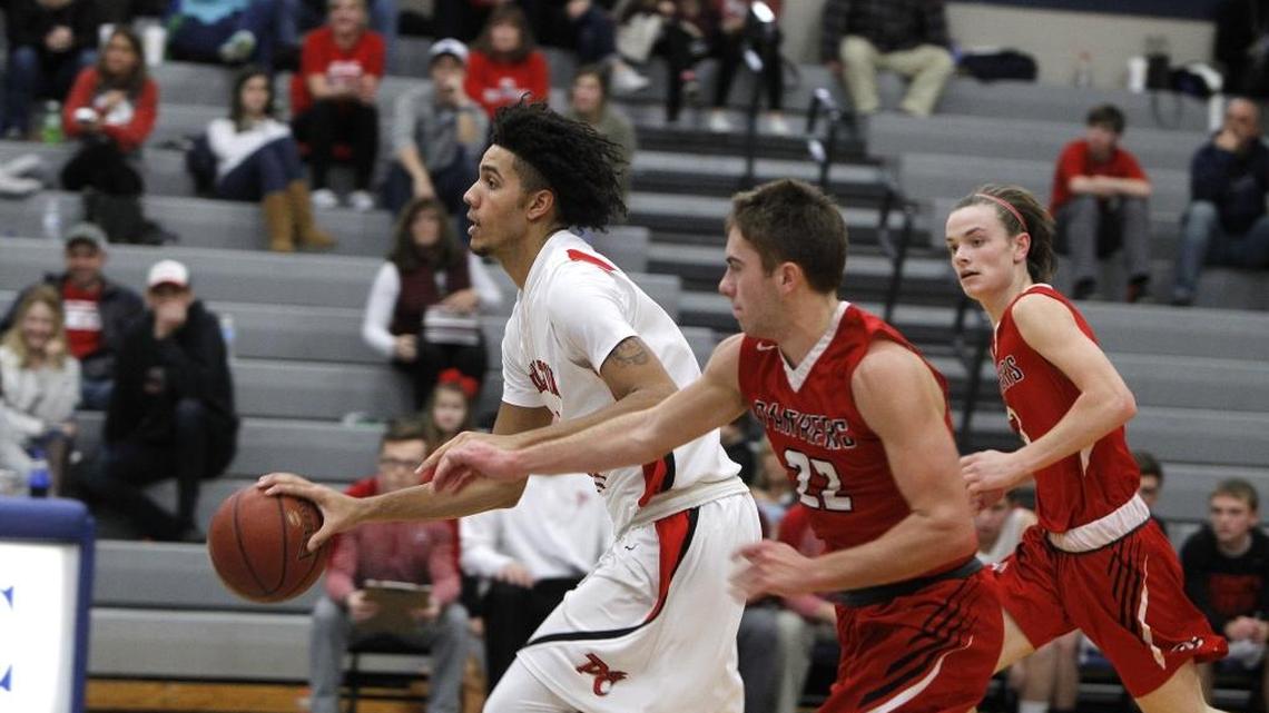 Pendleton County's Dontaie Allen moves the ball against Daviess Co. during the Republic Bank Holiday Classic in the Bueter Gymnasium at Lexington Catholic in Lexington, Ky., Wednesday, December 27, 2017.