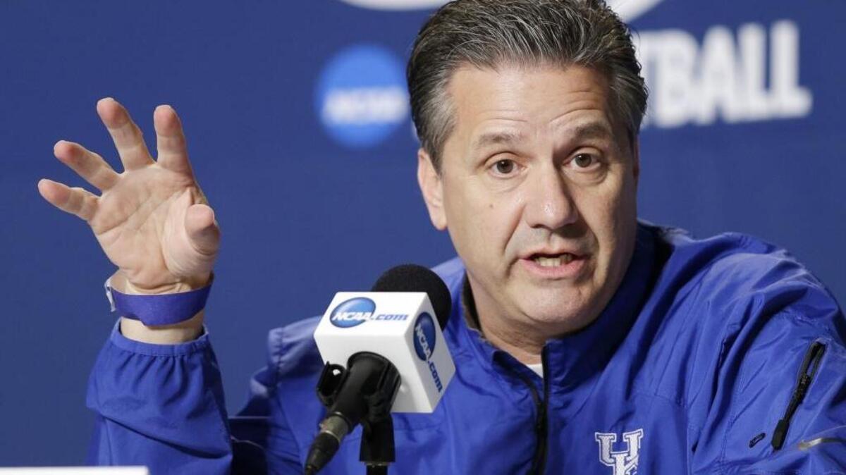John Calipari answers questions during a news conference at the NCAA tournament earlier this year.