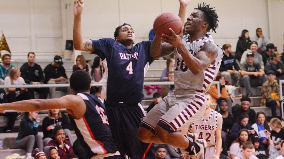 Jalen Coates (10) led Campbellsville with a career-high 27 points and 10 assists for his first double-double as a Tiger. Chance Morton (4) topped Cumberlands with 34 points and 15 rebounds.