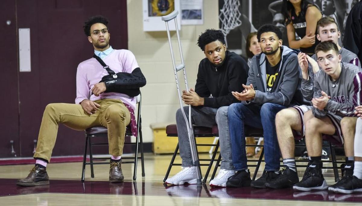 Jackson Davis, left, and Dedric Boyd, next right with crutches, looked on with injuries from the end of the Eastern Kentucky bench as the Colonels played Morehead State in Richmond on Saturday.