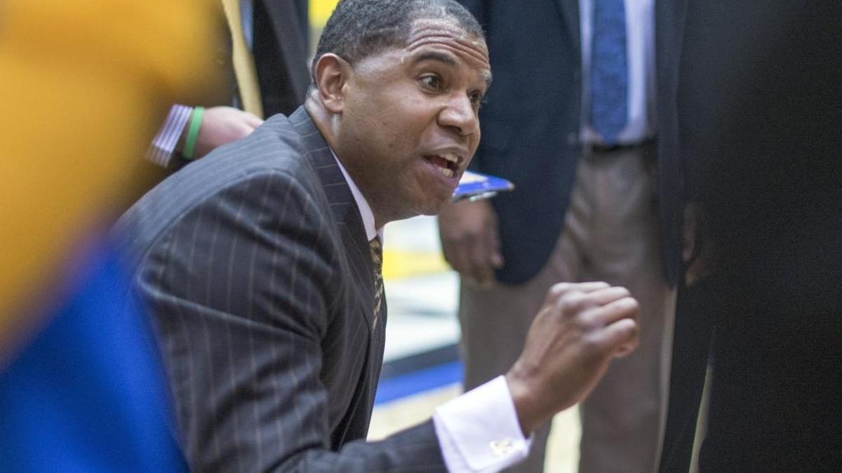 Morehead State coach Sean Woods talks to his team during a timeout in their Ohio Valley Conference game against Eastern Kentucky State Thursday Feb. 11, 2016 in Morehead, Ky.