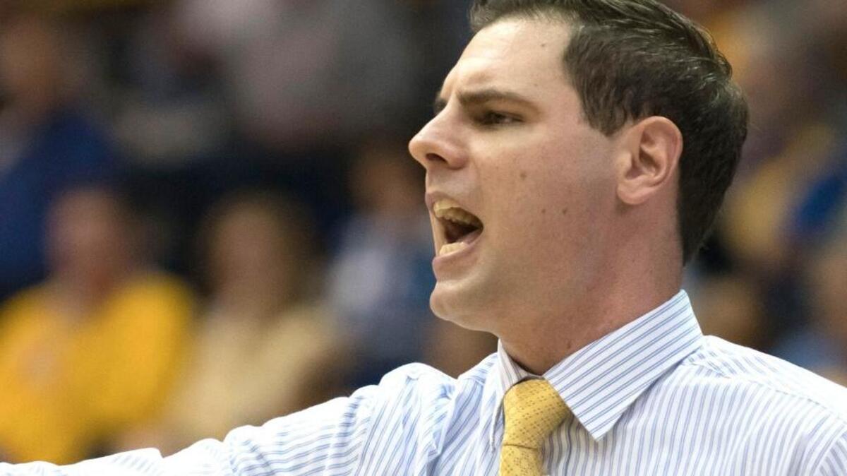 Morehead State dropped the interim label from Preston Spradlin’s title and made him head men’s basketball coach Thursday.