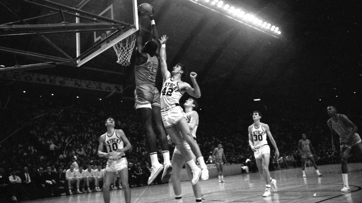 Texas Western’s David Lattin (42) put up a shot in from of Kentucky’s Pat Riley during the NCAA Championship game featuring Kentucky and Texas Western on March 19, 1966 in College Park, Md. Texas Western beat Kentucky's Rupp’s Runts 72-65.