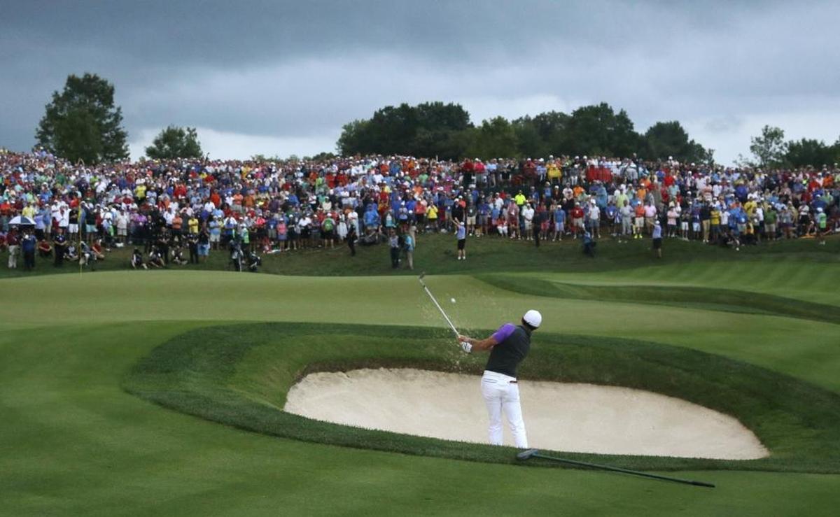 Rory McIlroy hits out of the bunker on the 18th hole during the final round of the PGA Championship at Valhalla Golf Club in Louisville in 2014. McIlroy won the event.
