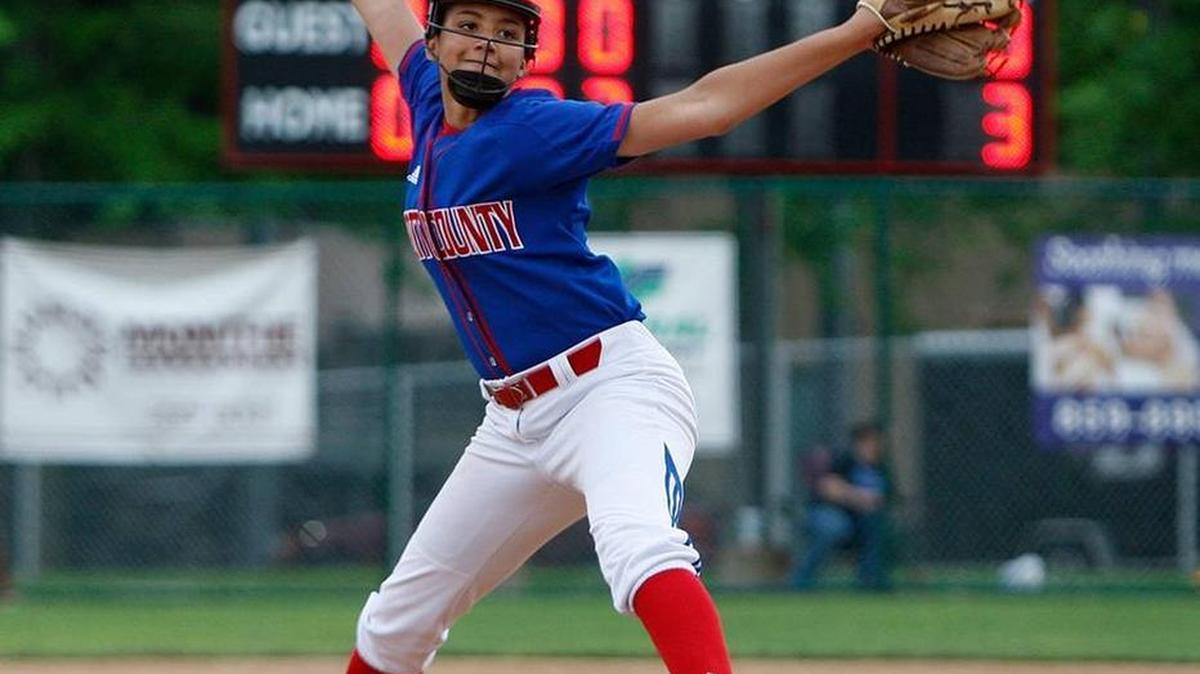 Scott County pitcher Kennedy Sullivan throws in the sixth inning against Woodford County during the 11th region softball championship at Paul Laurence Dunbar softball field in Lexington, Ky., Thursday, May 28, 2015.