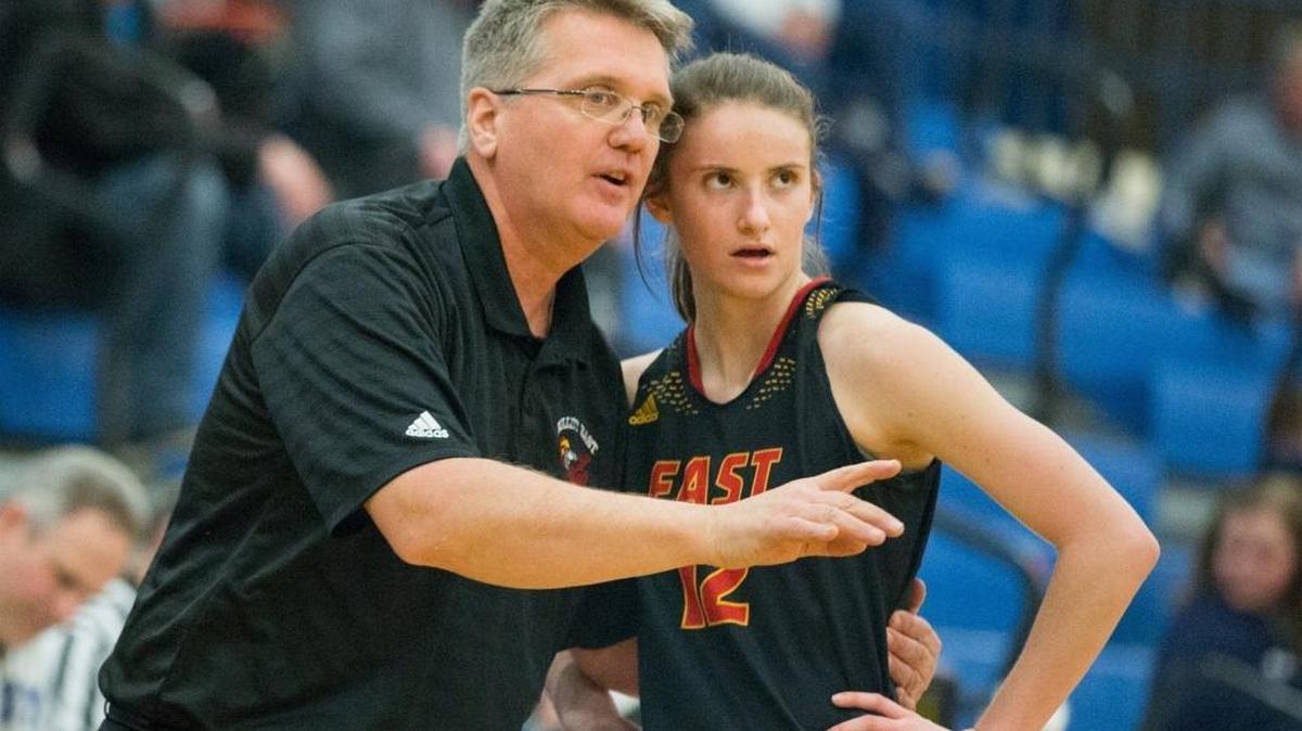 Bullitt East's head coach Chris Stallings gave Lindsey Duvall (12) instructions as Bullitt East defeated Franklin County 72-61 on Monday Feb. 15, 2016 in Frankfort, Ky.