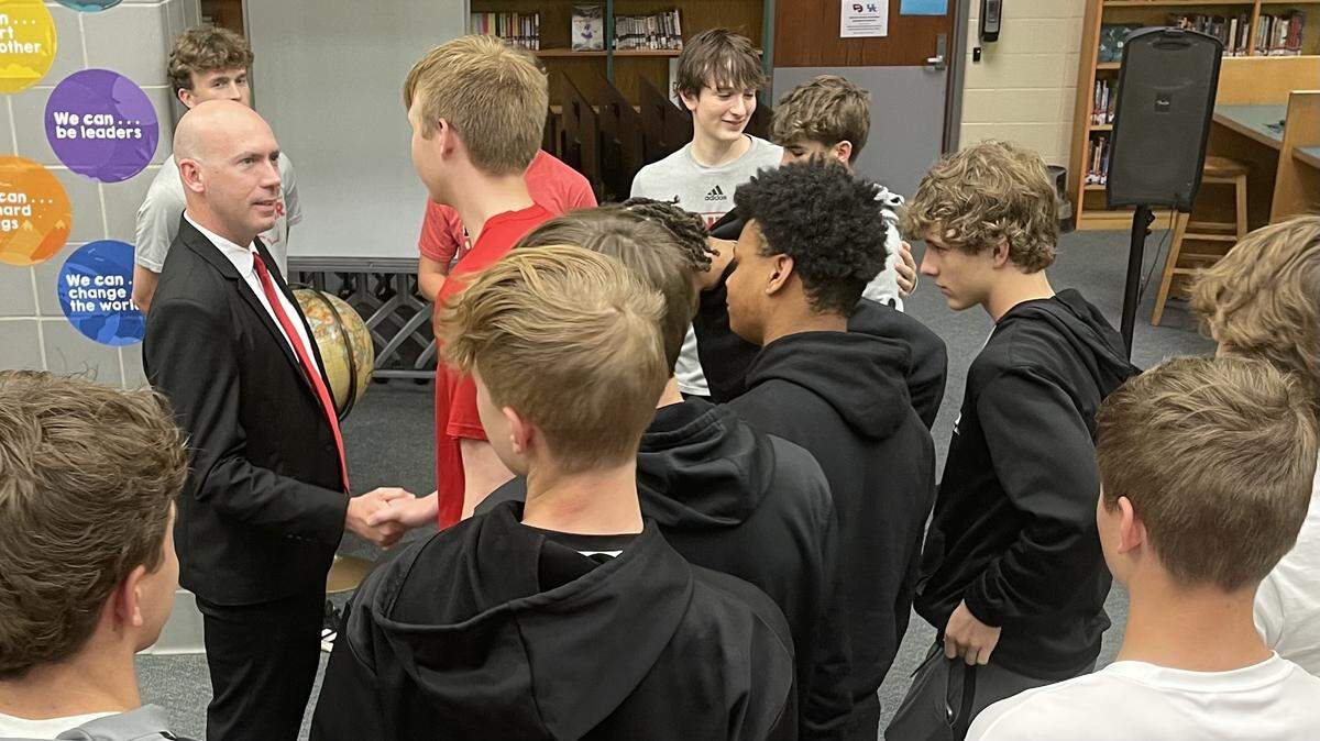 New Paul Laurence Dunbar boys’ head basketball coach John Morgerson met with some of the team’s players during his introduction at the school’s library on Thursday.