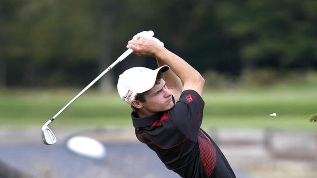 Billy Tom Sargent of Scott Co. tees off on the 15th hole during the regional golf tournament at Kearney Hill Links in Lexington, Ky., Monday, September 30, 2013.