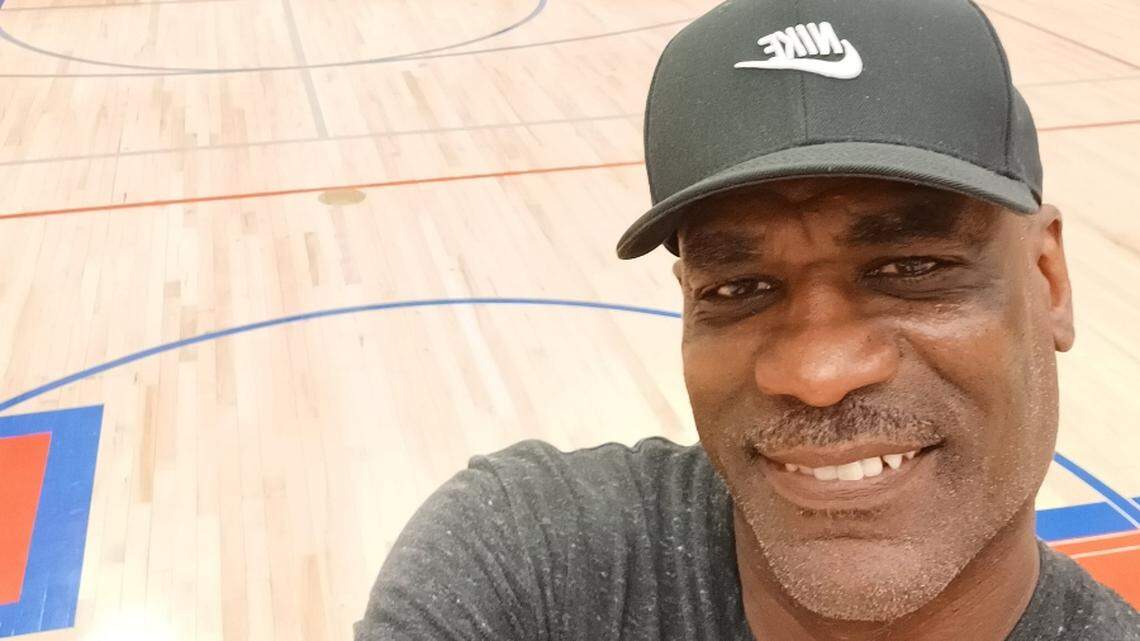 Lafayette High School’s new boys’ basketball head coach Vince Sanford took in the moment of his arrival as coach by documenting his first day as head coach with a selfie at center court of the school’s gym.