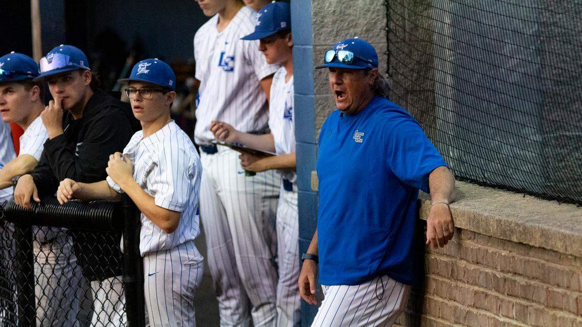 Lexington Catholic coach Scott Downs cheers on a play during the Knights’ 6-0 win at home against Lafayette on April 30, 2025.