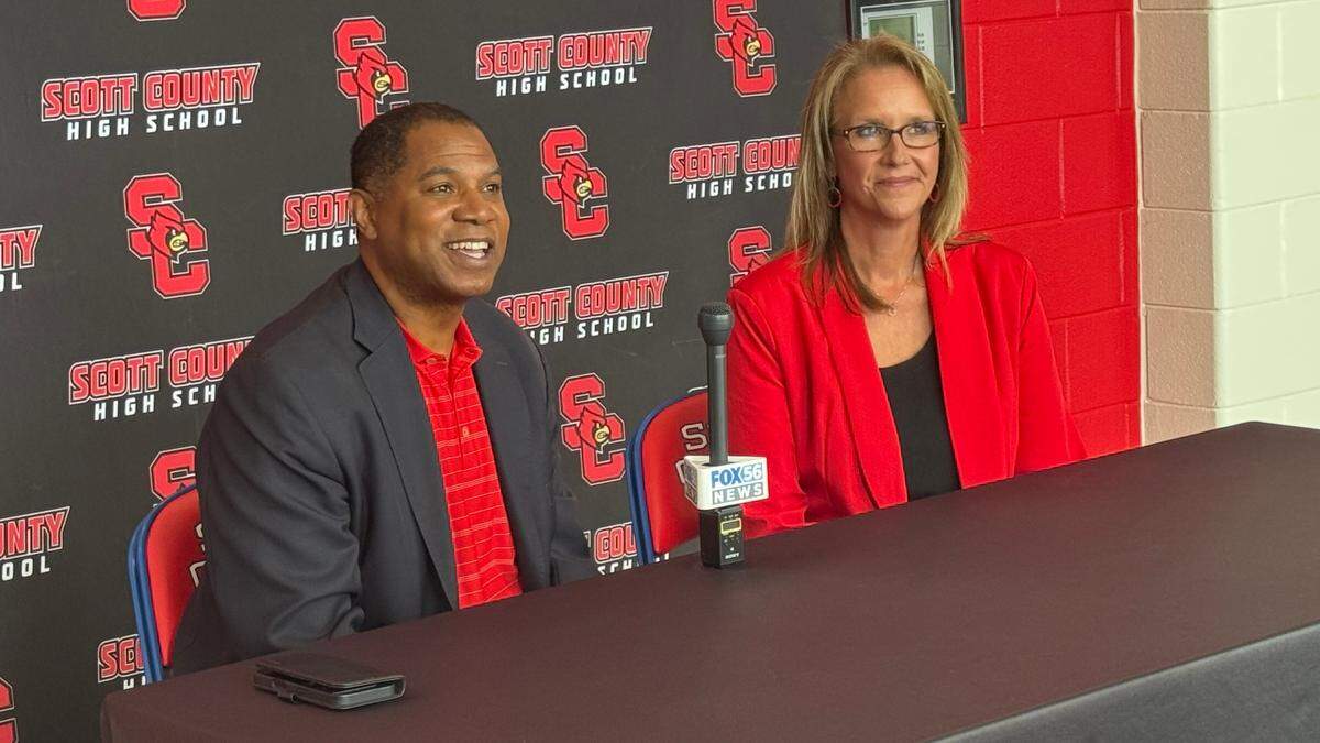New Scott County boys basketball coach Sean Woods, with principal Elizabeth Gabehart, took questions during his introductory press conference at the high school’s Billy Hicks Gymnasium in Georgetown on Tuesday.