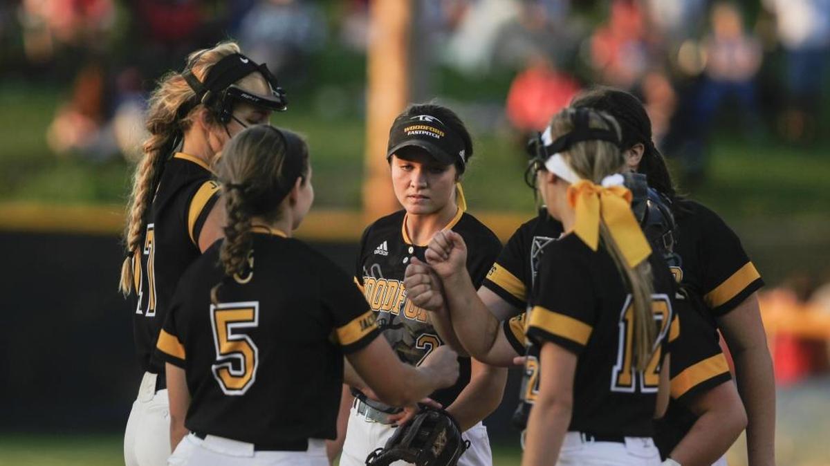 Woodford County players huddle and encourage one another during the Woodford County Yellowjackets vs the Scott County Lady Cards softball game at Franklin County High School on Tuesday, May 30, 2017 in Frankfort, Ky. The Yellowjackets defeated the Lady Cards 1-0.