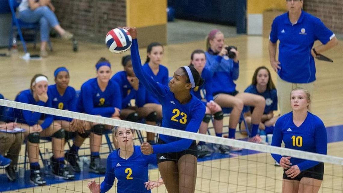 Henry Clay's Kaitlyn Hord (23) hit the ball as host Henry Clay defeated Dunbar 3-0 on Tuesday September 8, 2015 in Lexington, Ky.