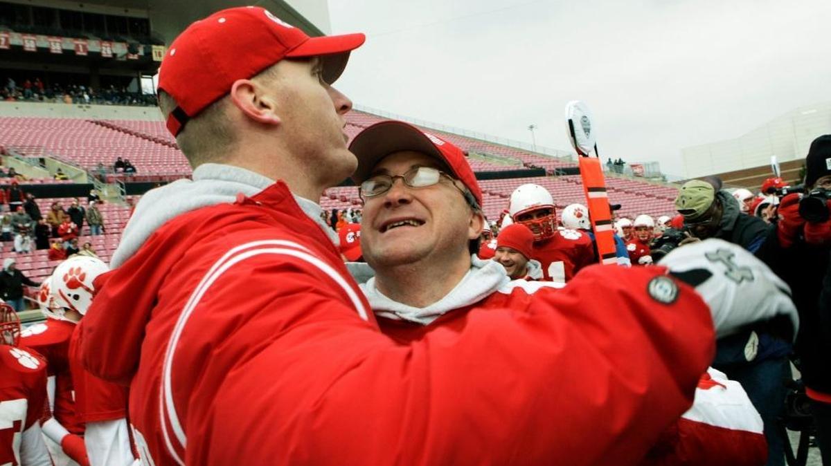 Beechwood Coach Noel Rash, right, was hugged by assistant coach Darrick Brilz after their team beat Hazard 14-7 to win the Class A state championship in 2008 in Louisville.