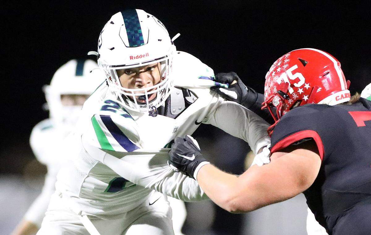 Great Crossing’s Oryend Fisher (27) has registered 13.5 quarterback sacks this season.