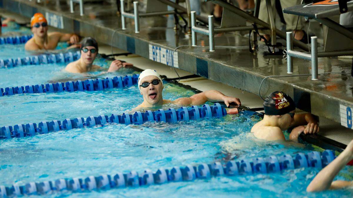 Henry Clay’s Nick Johnson stuck his tongue out after seeing he’d won the 100-yard freestyle at the Region 8 Swimming and Diving Championships at Stivers Aquatic Center in Barbourville on Saturday.
