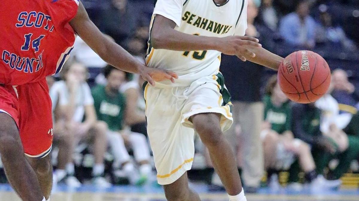 Emory Knox (13) of Myrtle Beach controls the ball in the game with Scott County, Ky.