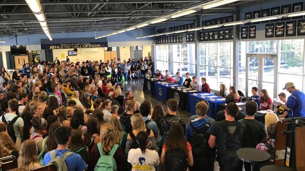 Friends and fellow athletes gathered as fourteen Henry Clay athletes signed with their respective colleges on Wednesday, April 29, 2017.