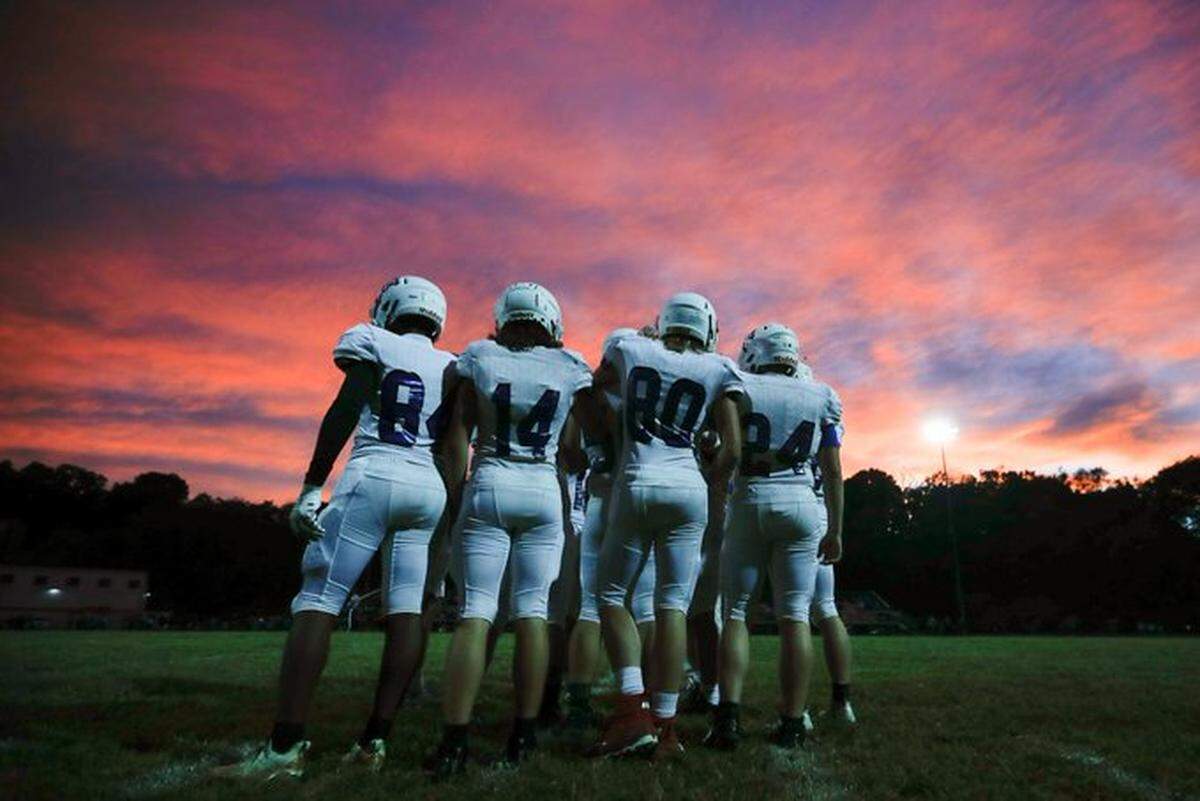The Bracken County Polar Bears huddle during their game at Paris High School this season. Week 1 of Kentucky’s high school football playoffs kicks off this week.