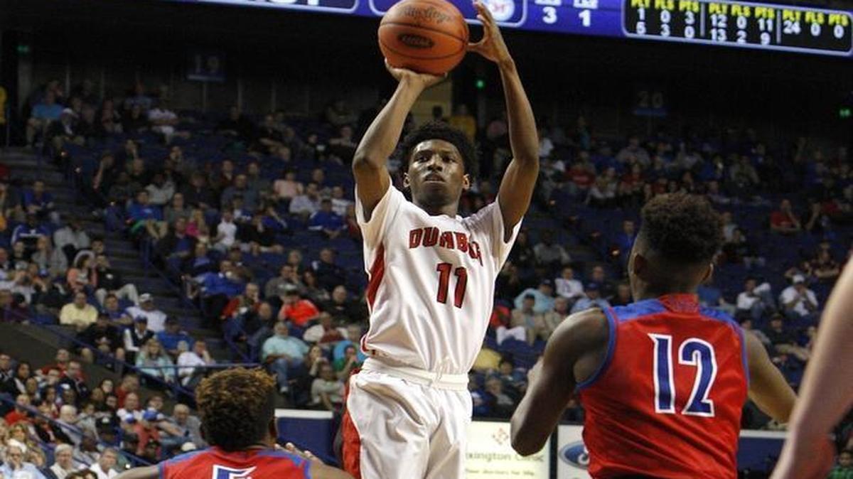 Paul Dunbar's Taveion Hollingsworth shoots against Mercer Co. in game 4 of the Whitaker Bank/KHSAA Sweet 16 state basketball championship in Lexington, Ky., Wednesday, March 16, 2016.