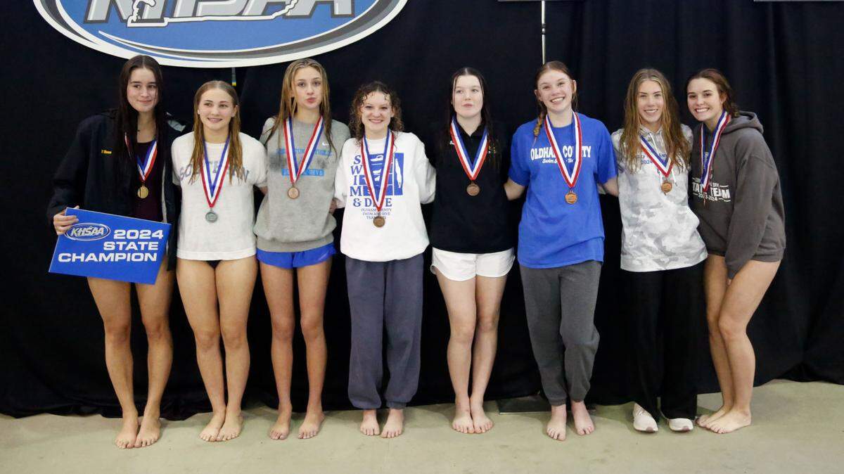 The KHSAA recognized eight medalists during Thursday’s girls state diving championships at UK. From left are: Peytton Moore, Cooper; Reagan Patterson, Madison Southern; Sydney Leslie, Lexington Catholic; Brooke Ronan, Oldham County; Grace Hedger, Campbell County; Kasia Korzeniowski, Oldham County; Claire Nicholas, Henry Clay; and Chris Nowak, Cooper.