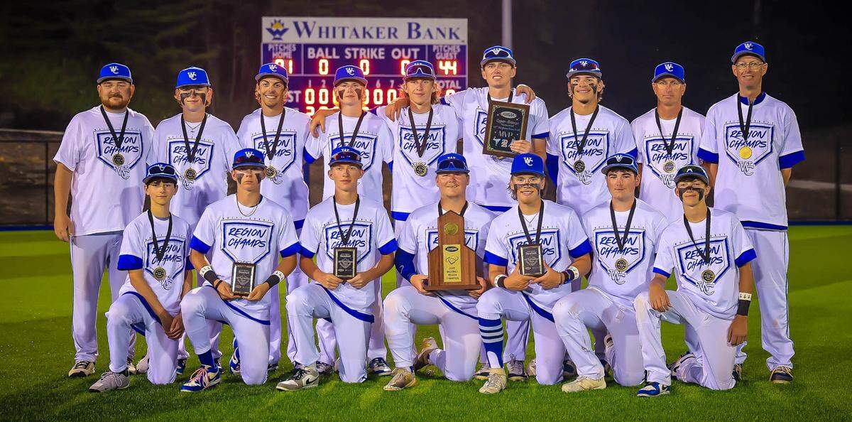 Wolfe County’s baseball team posed with the championship trophy after its 2-0 win over Powell County in the 14th Region Tournament championship game at Wolfe County High School in Campton on Thursday.