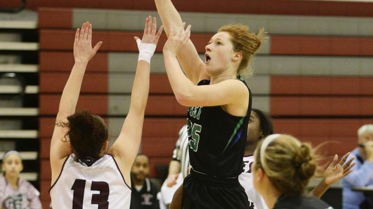 East Jessamines Emma Young scored on the Tates Creek defense on Wednesday February 10, 2016 in Lexington, Ky.