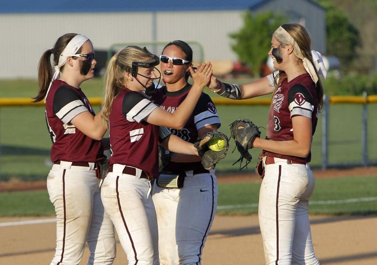 Tates Creek players celebrated during the 43rd district softball championship at LCA softball field in Lexington, Ky., Friday, May 26, 2017.