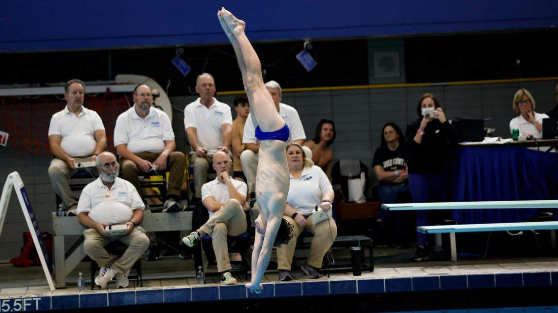 Henry Clay’s Jonah Kearns straightened to complete a dive at the KHSAA Boys State Diving Championships at the University of Kentucky’s Lancaster Aquatic Center on Saturday.