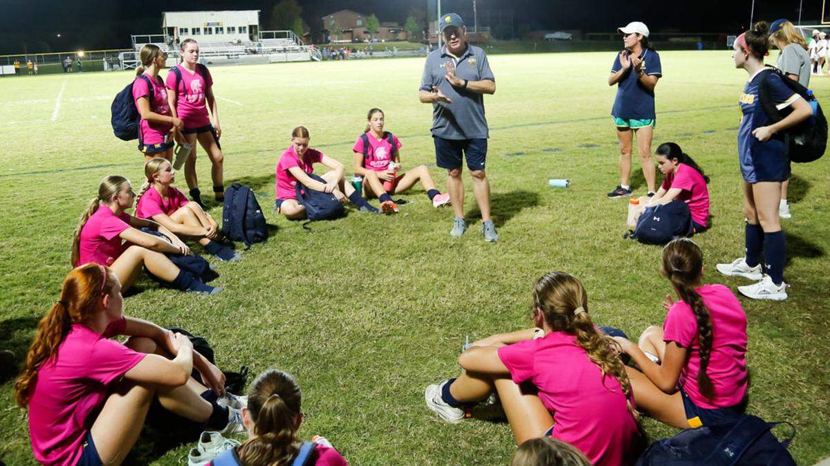Sayre coach Michael McKinney delivers his postgame remarks to his team after the Spartans’ 7-0 victory over Bryan Station at Sayre Athletic Complex on Wednesday.