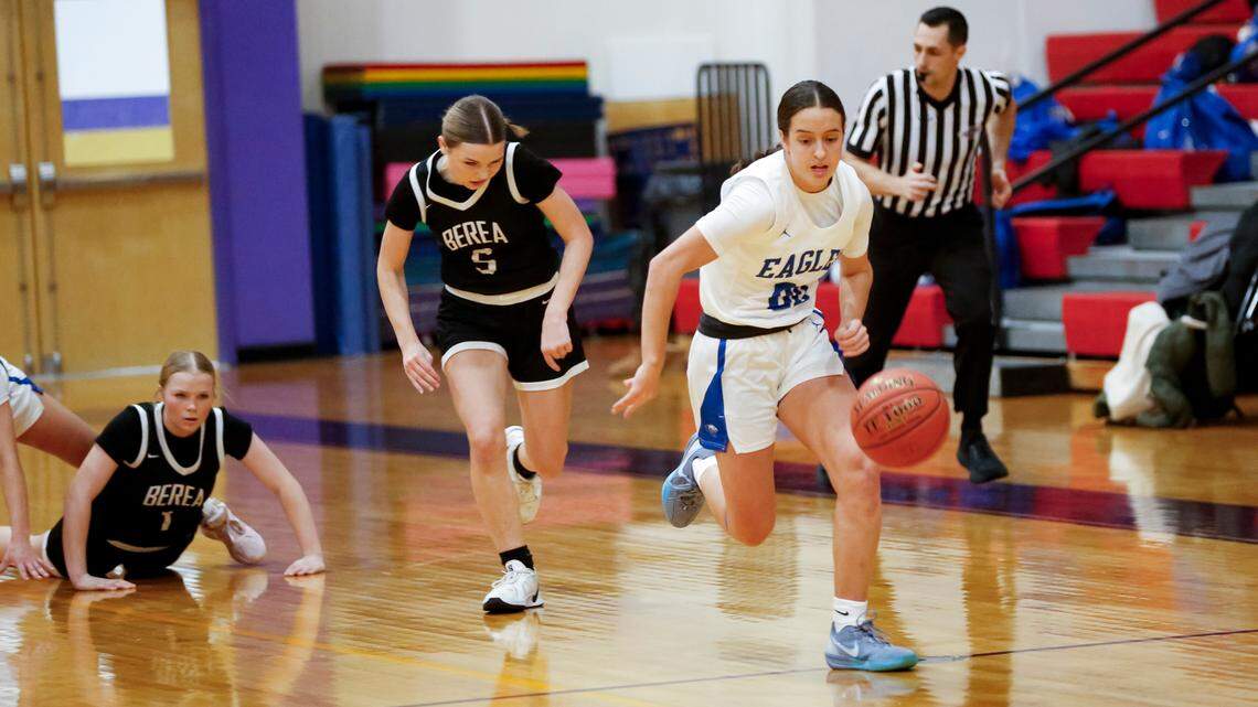Lexington Christian’s Piper Graham (00) broke away from Berea’s Kelsey Slone (5) and Avery Plessinger after a Pirates’ turnover during the Eagles’ 71-20 win in the girls 11th Region All “A” Classic tournament at The Frankfort Christian Academy in Frankfort on Jan. 12.