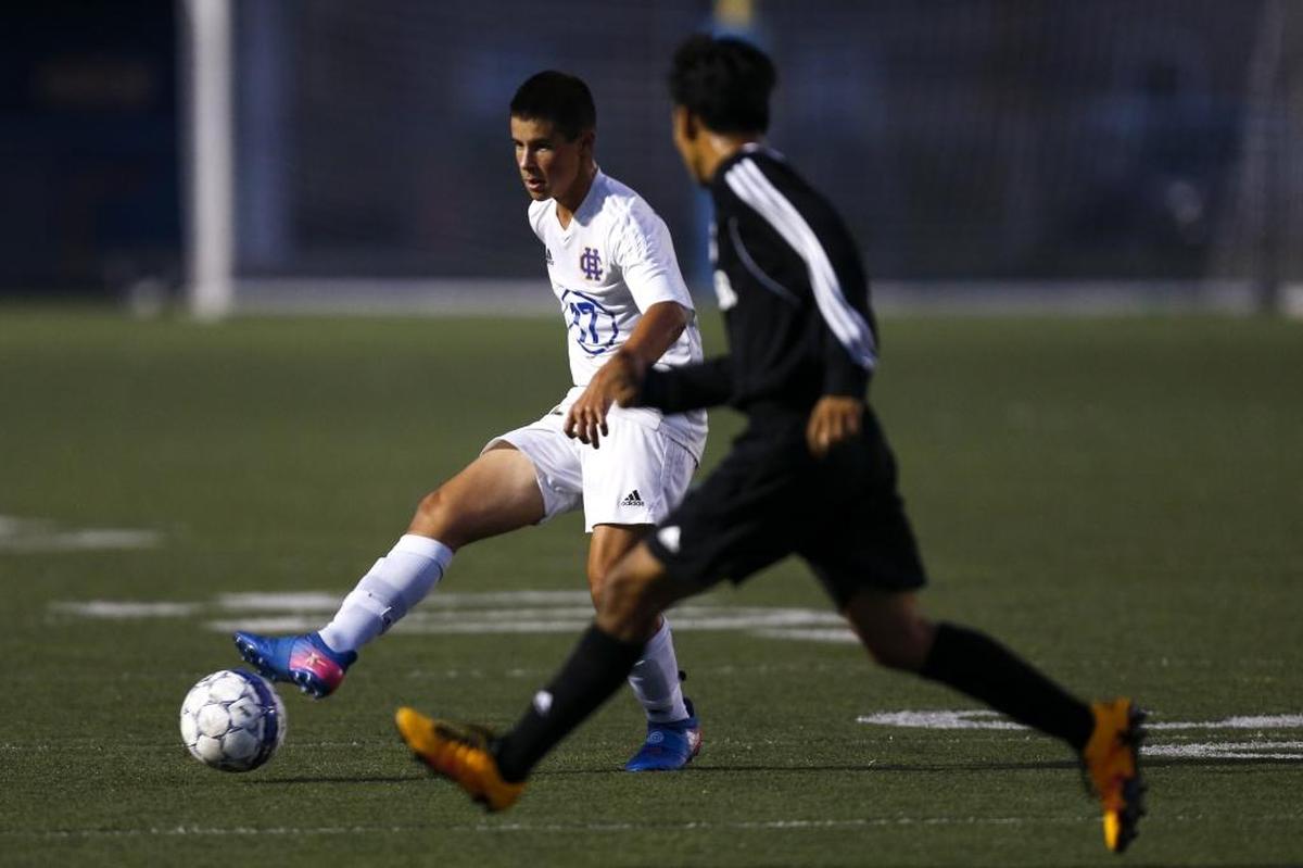 Henry Clay defender Vincent Lopiccolo #17 passes the ball against Paul Laurence Dunbar during the boy's soccer match at Henry Clay High School in Lexington, Ky., on Tuesday, August 29, 2017.
