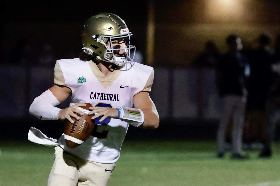 Cathedral quarterback Danny O’Neil threw for one touchdown and ran for another as the Indianapolis private school defeated Frederick Douglass 28-19 in Lexington on Sept. 22, 2023.