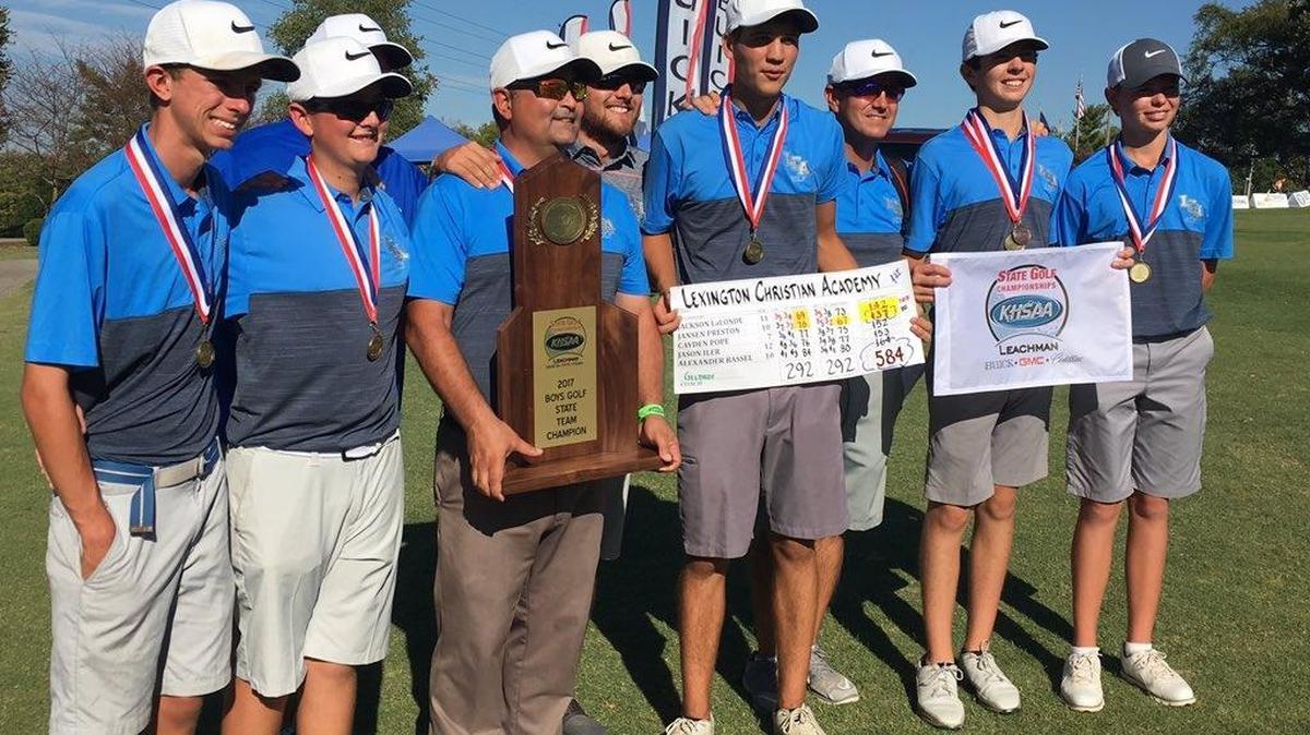 Members of the Lexington Christian Academy boys’ golf team posed with their scorecard and championship trophy after winning the team title at the Leachman Buick-GMC-Cadillac/KHSAA Boys’ State Golf Championship on Wednesday, Oct. 4, 2017 in Bowling Green, Ky.
