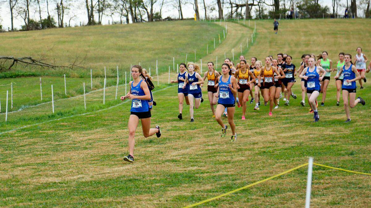 Lexington Catholic’s Caroline Beiting (104) and Anna Dawahare (105) ran out to the front at the start of the girls Class 2A Region 4 Cross Country Championship at Bourbon County Park in Paris on Saturday.