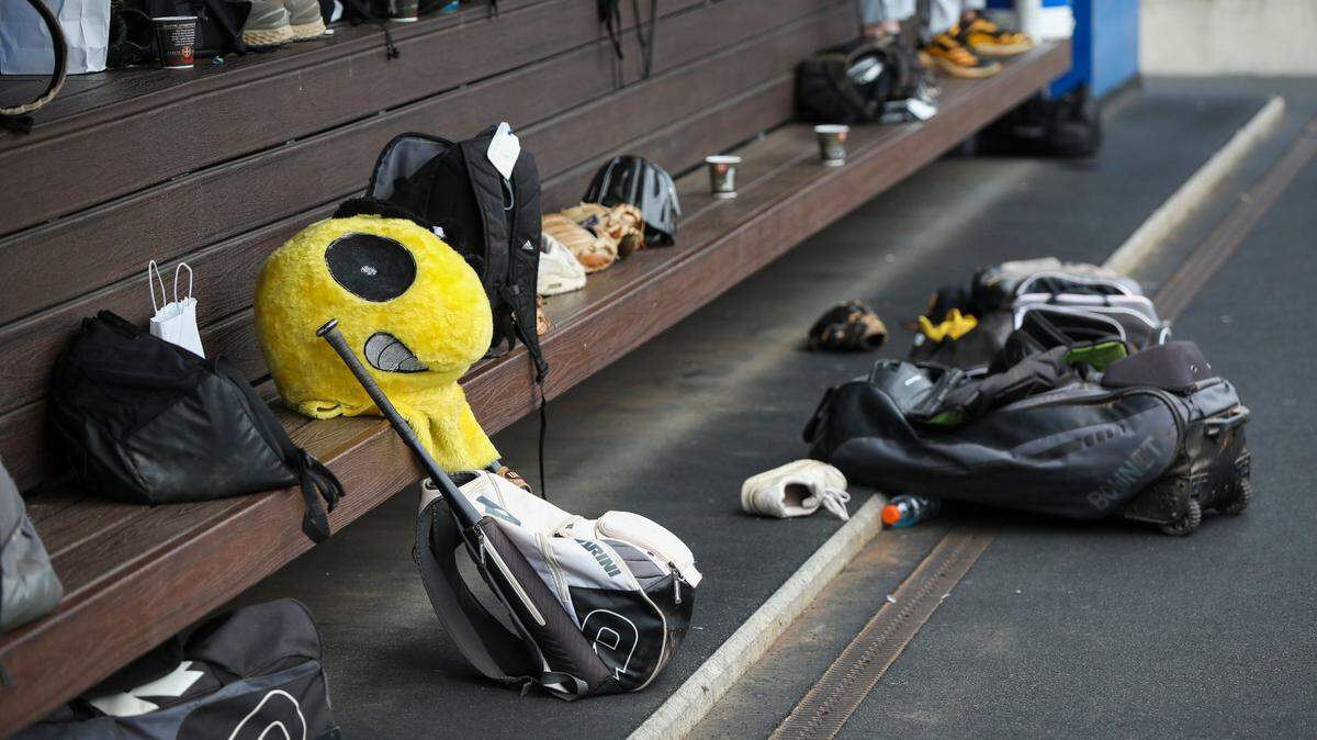 A Woodford County Yellow Jackets mascot head sits on the bench in the dugout during last year’s state tournament at Kentucky Proud Park in Lexington.
