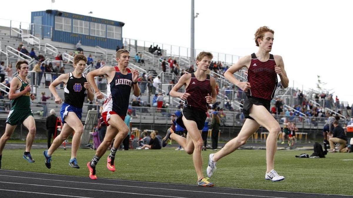 Tates Creek’s Kyle Sprague, who finished third, leads eventual winner and teammate Alex Mortimer and Lafayette’s Caleb Joy, who was second, in the boys’ 1600 meters during the city track meet at Henry Clay on Tuesday.