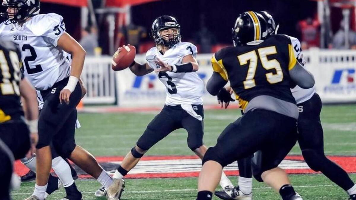 South Warren’s Ryder Litten (3) dropped back to pass against Johnson Central.