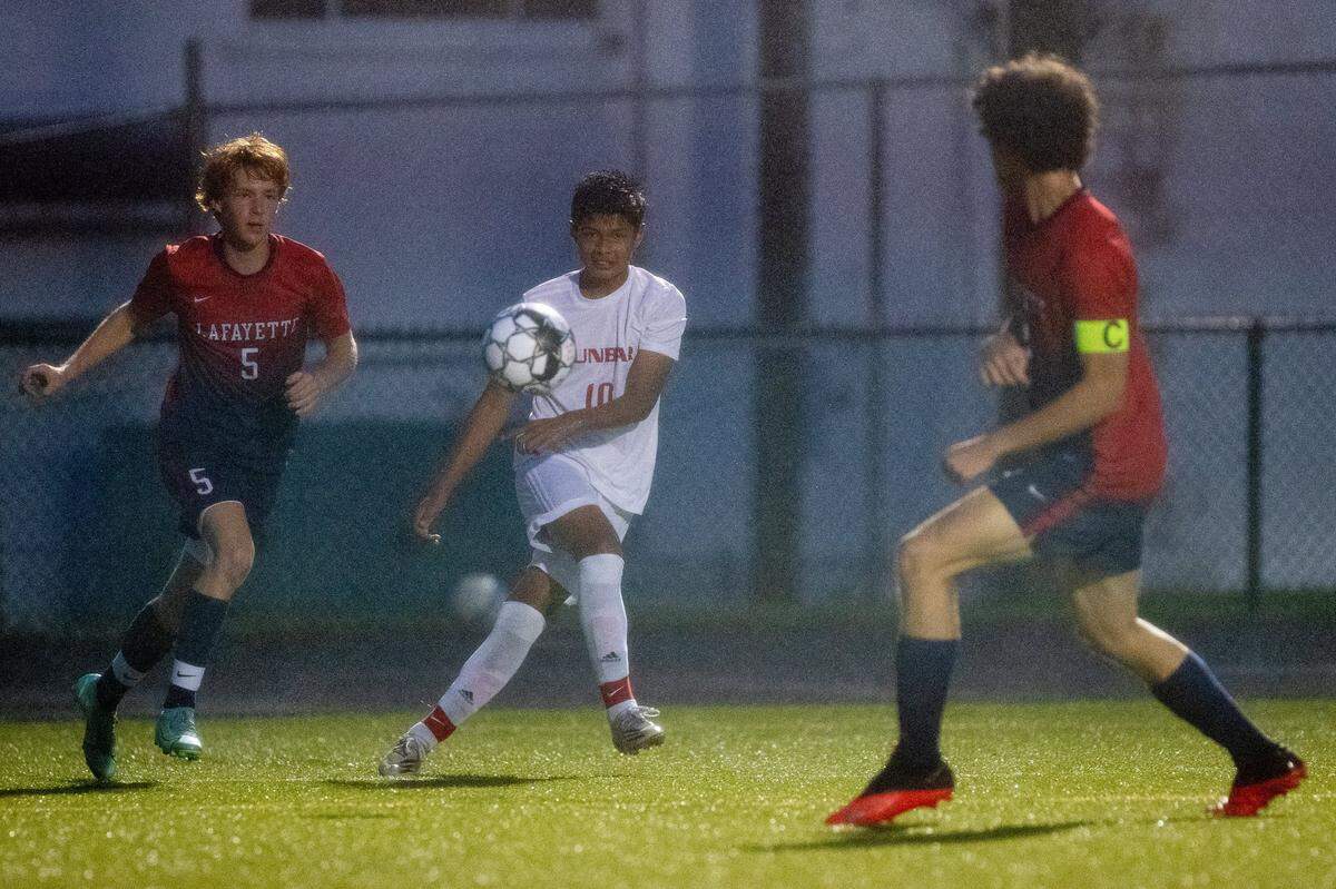 Paul Laurence Dunbar’s Joany “Gio” Chavez (10) makes a pass during a match last season. Several players graduated after last season’s state championship but the Bulldogs still boast depth for 2022.