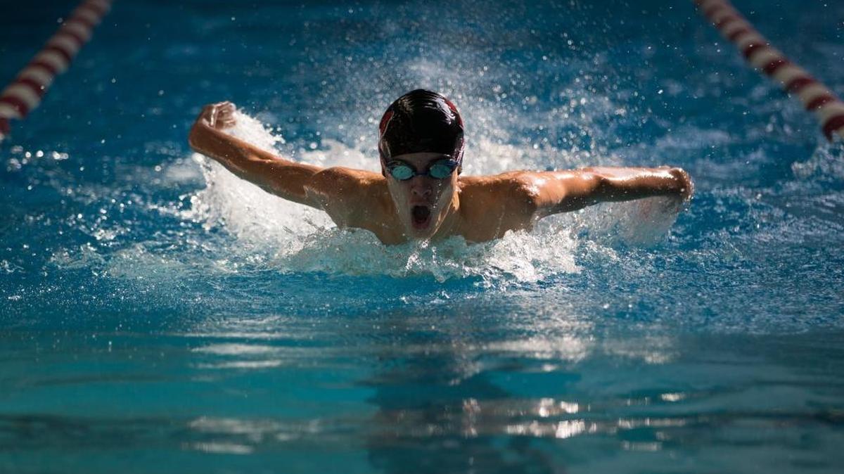 Paul Laurence Dunbar’s Aidan Sturgill competed in the 100-yard butterfly at the All-City swim meet at Transylvania on Saturday Dec. 12, 2015, in Lexington.