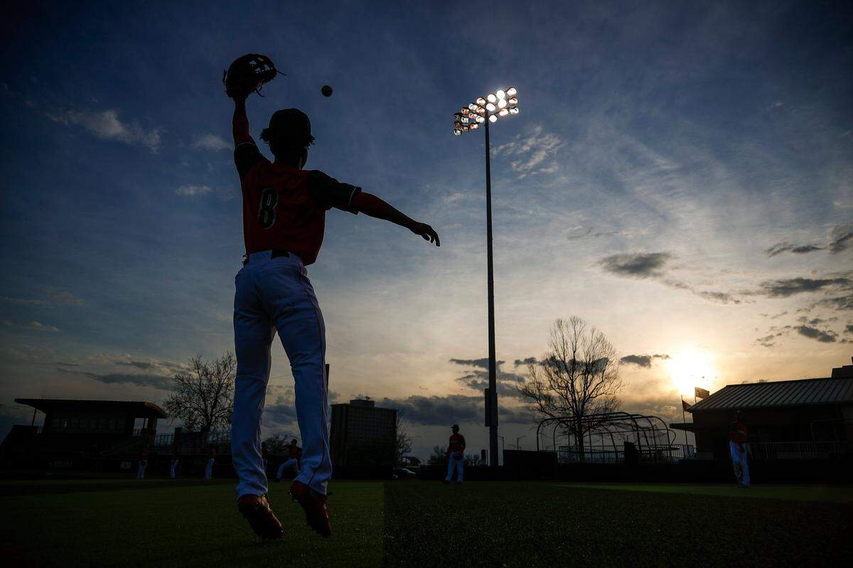 Jeremiah Lowe of Frederick Douglass warms up before facing Henry Clay during a game this season in Richmond.