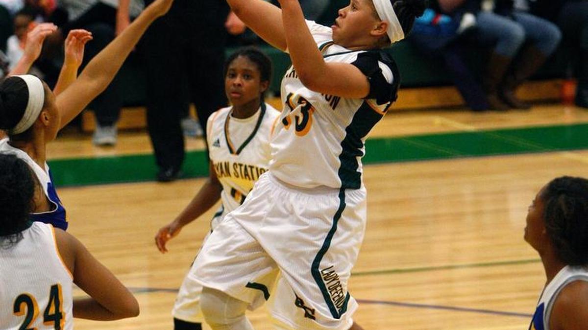 Bryan Station's Carah Burdette shoots in the second half against Henry Clay at Bryan Station in Lexington, Ky., Tuesday evening, December 7, 2014.