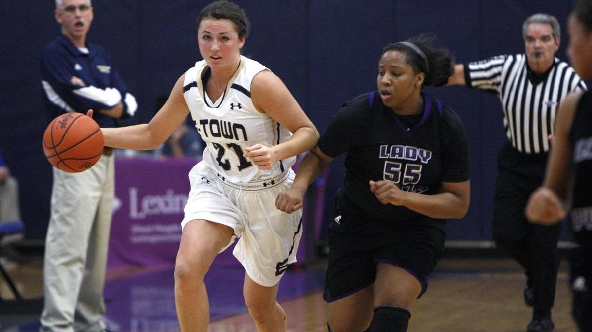 Elizabethtown’s Erin Boley dribbled against Bowling Green’s Taylor Hunter during the semifinals of the Traditional Bank Holiday Classic at Lexington Catholic on Dec. 22, 2015.