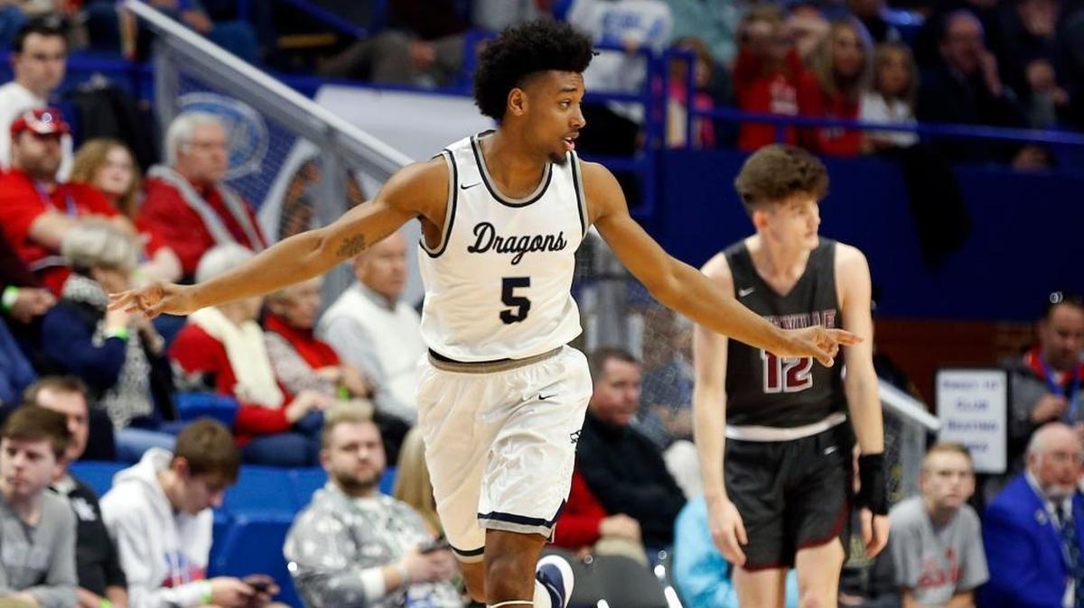 Warren Central guard Skyelar Potter (5) flew up court after hitting a three-pointer in front of Pikeville forward Cade Byers (12) as Pikeville played Warren Central in the quarterfinal round of Whitaker Bank/KHSAA Boys' Sweet Sixteen in Rupp Arena. This is first quarter action.